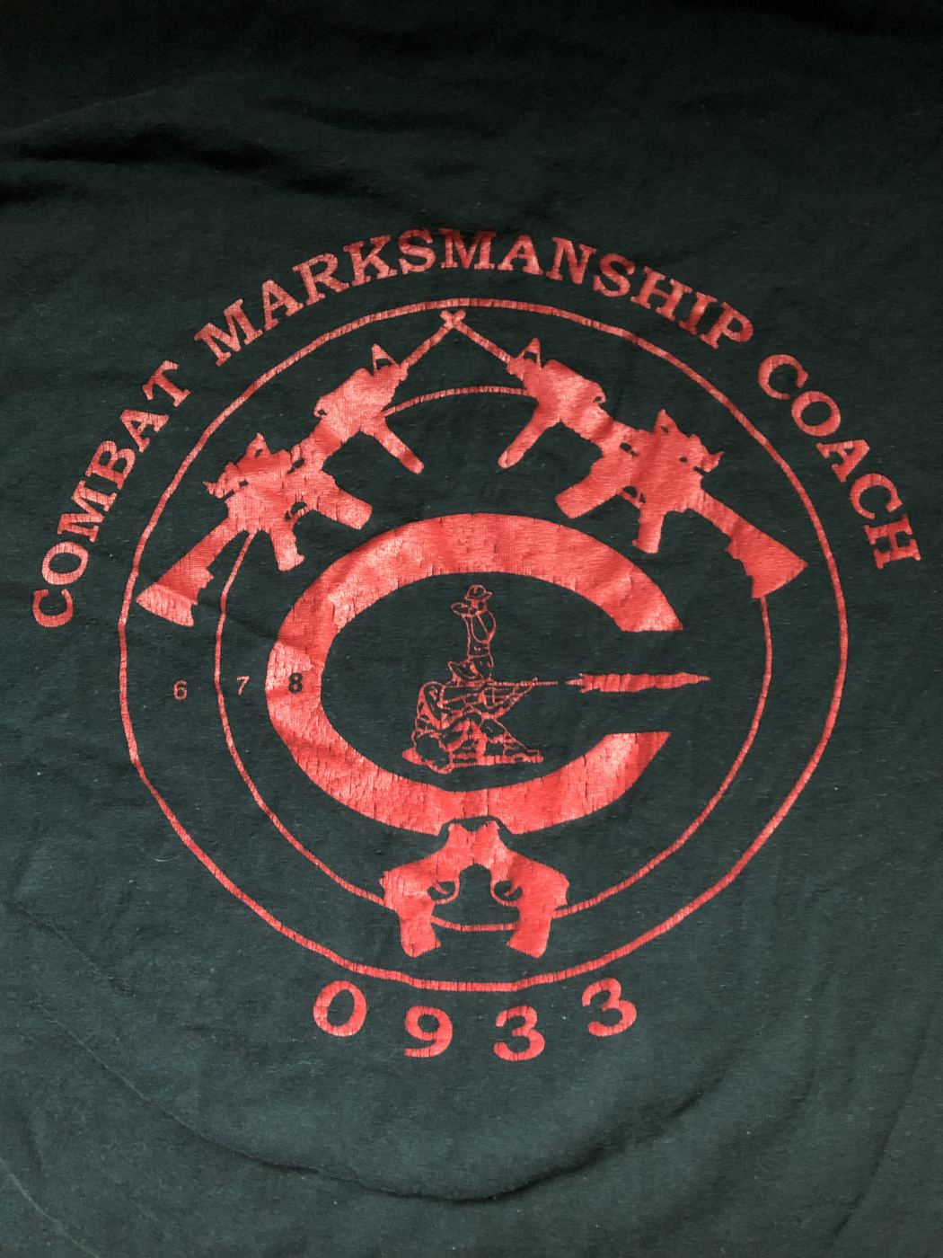 Andrew's combat marksmanship coach shirt from the Marines