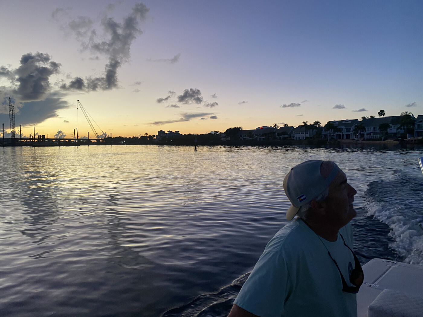 Noah by the water at sunset